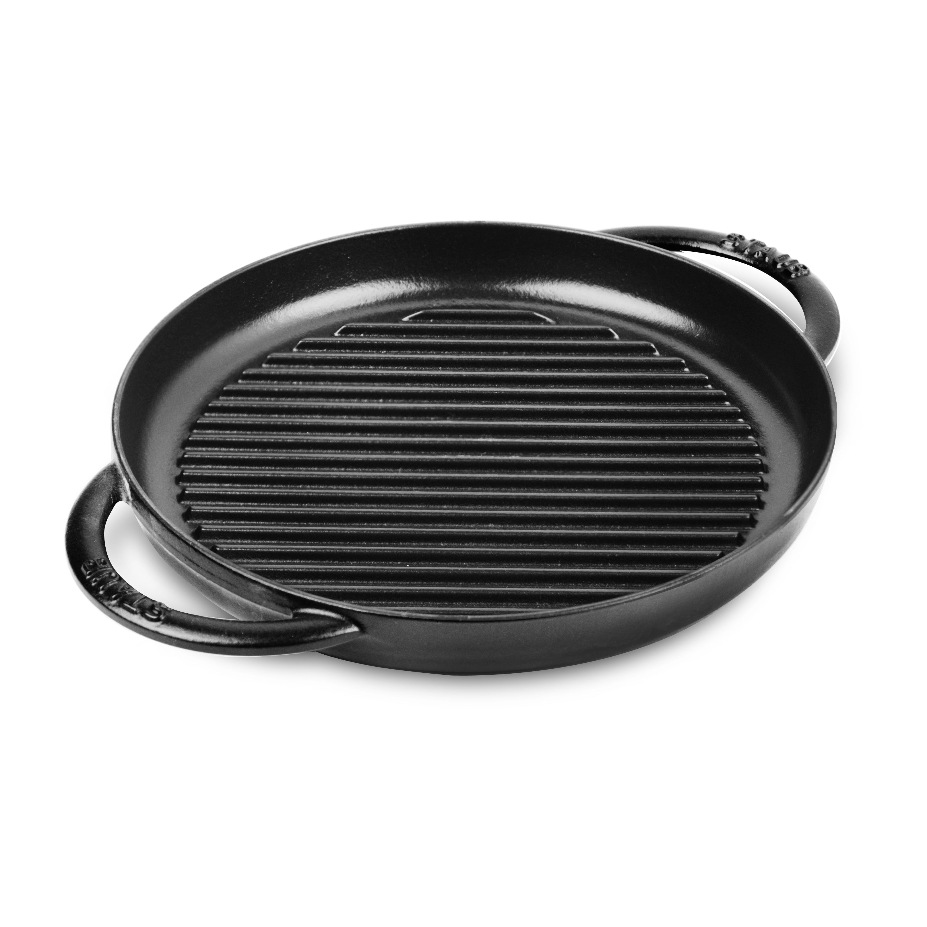 Staub 10-inch grill pan captured from above, showcasing its matte black finish and textured interior.