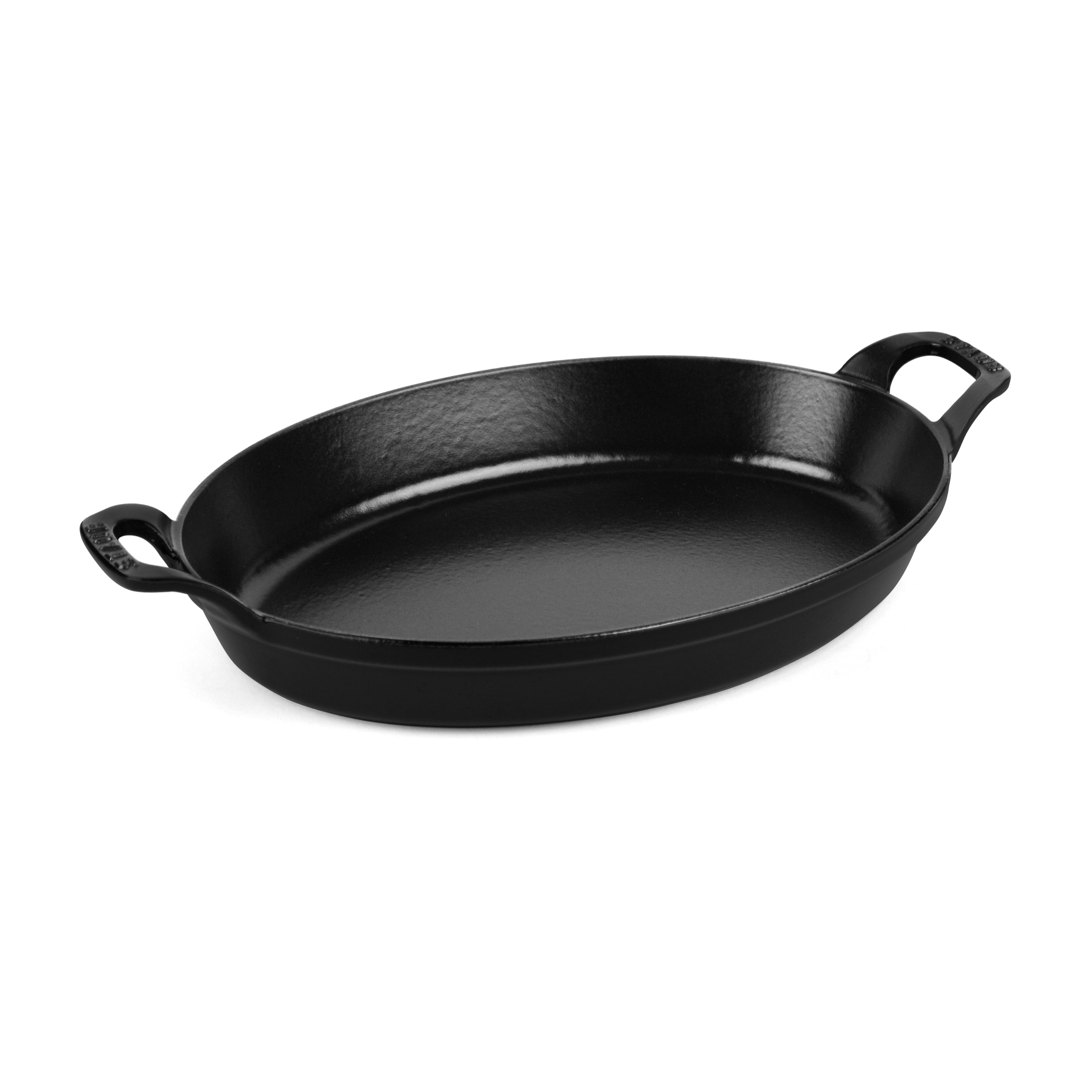 Elegant enameled cast iron au gratin dish showcasing its sleek black matte finish and heat distribution capabilities.