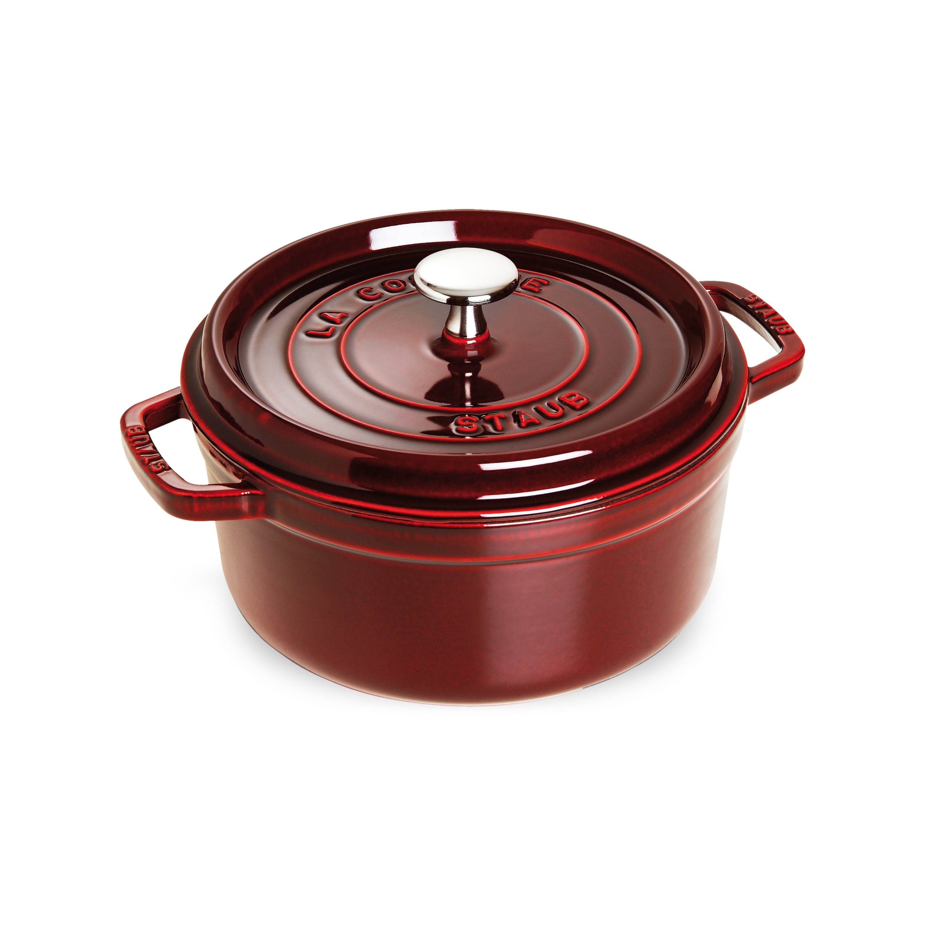 Grenadine Red Dutch Oven showcasing its smooth enamel finish and nickel-plated knob.