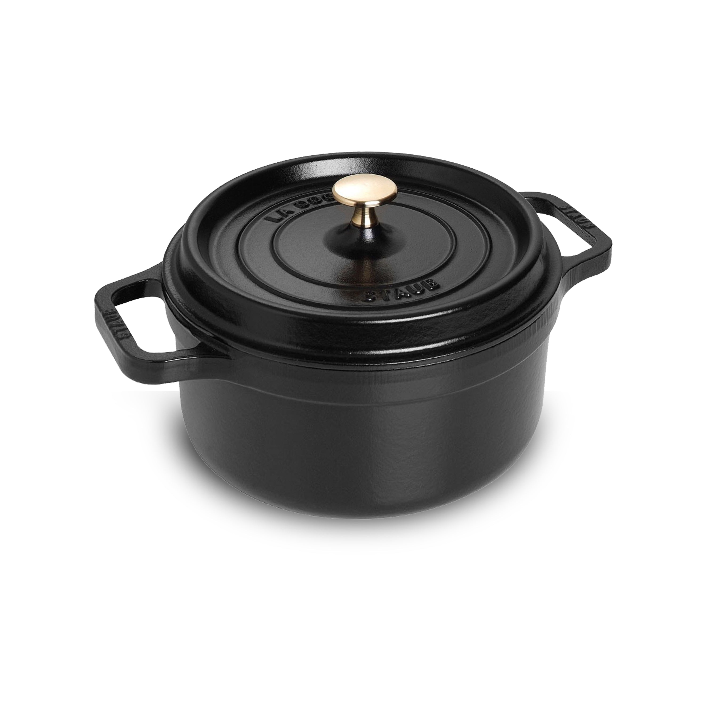 Close-up view of Staub cast iron Dutch oven showing textured interior and nickel-plated knob.