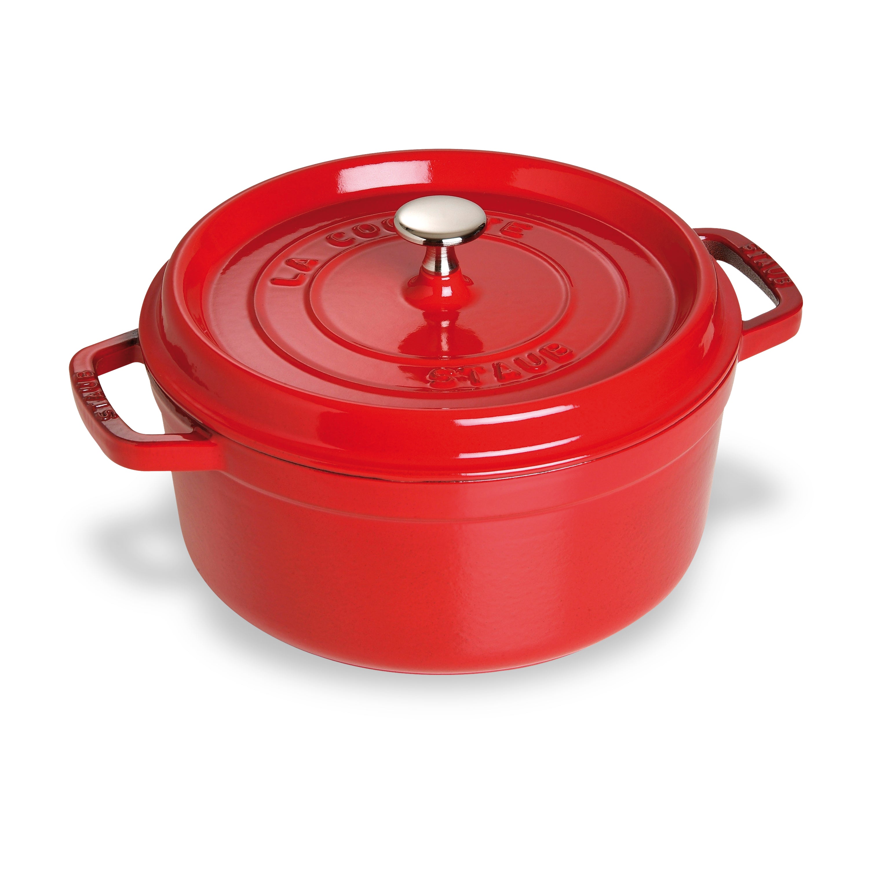 Front view of Staub cherry red Dutch oven on stovetop