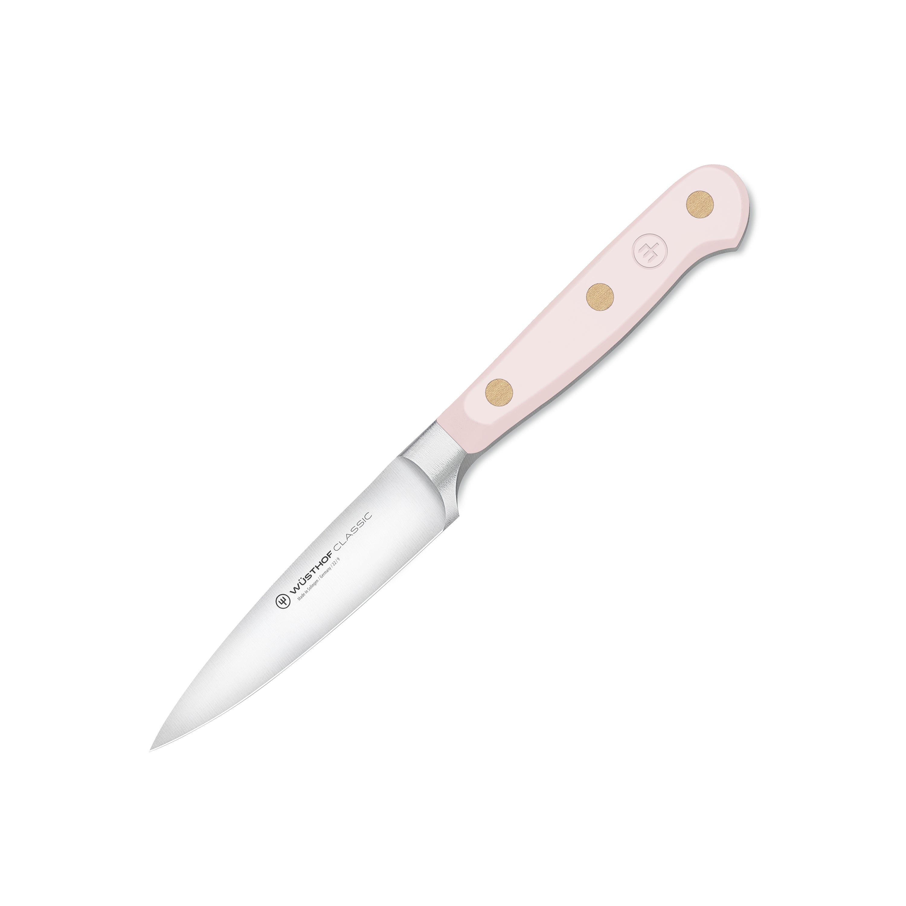 Close-up of the Wusthof Classic Pink Himalayan Salt Paring Knife showing the sharp blade and ergonomic handle.