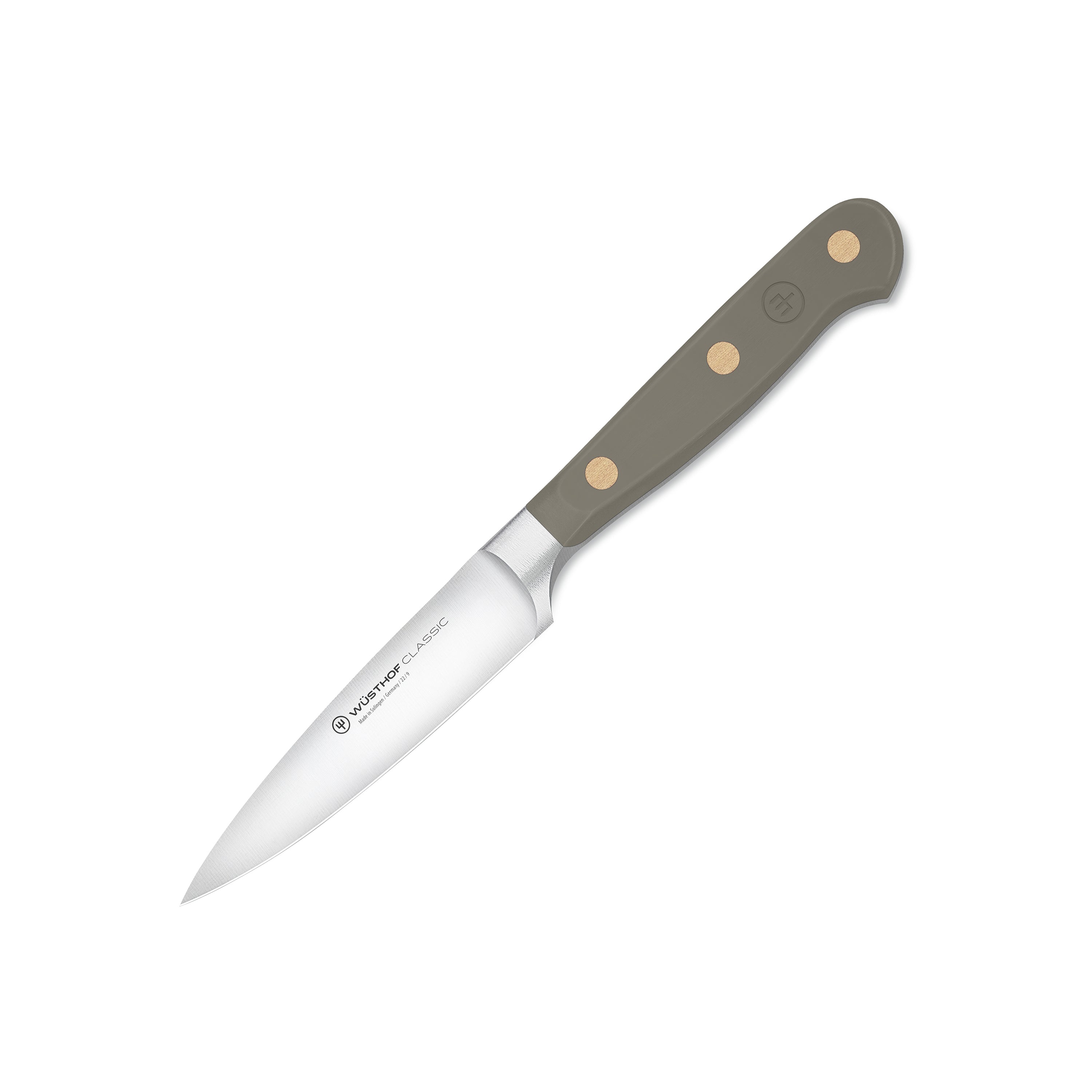 Detailed view of the Wusthof Classic 3.5" paring knife highlighting its sharp blade and ergonomic design.