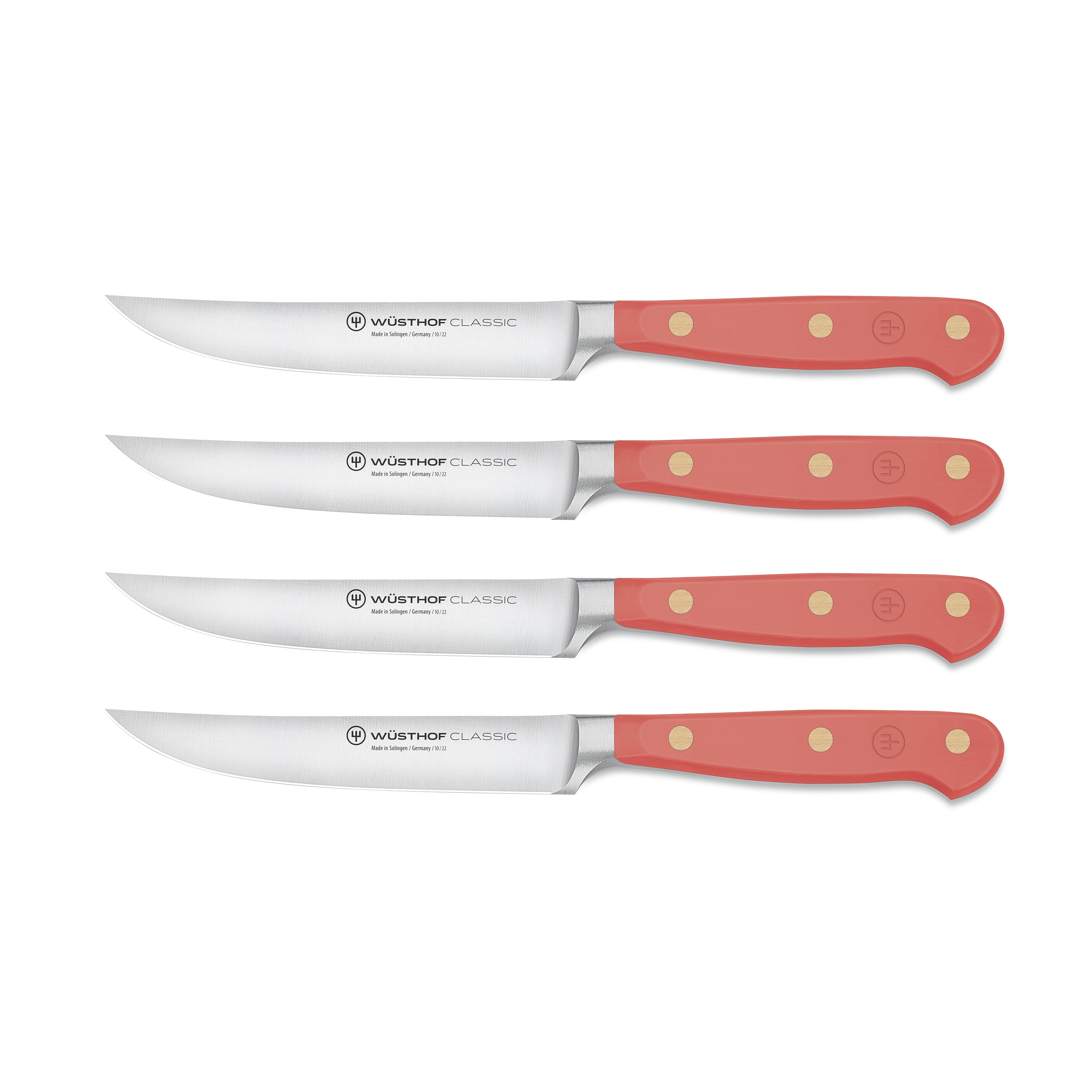 Close-up view of the Wusthof Coral Peach Steak Knife Set showcasing the high-carbon steel blades and precision craftsmanship.