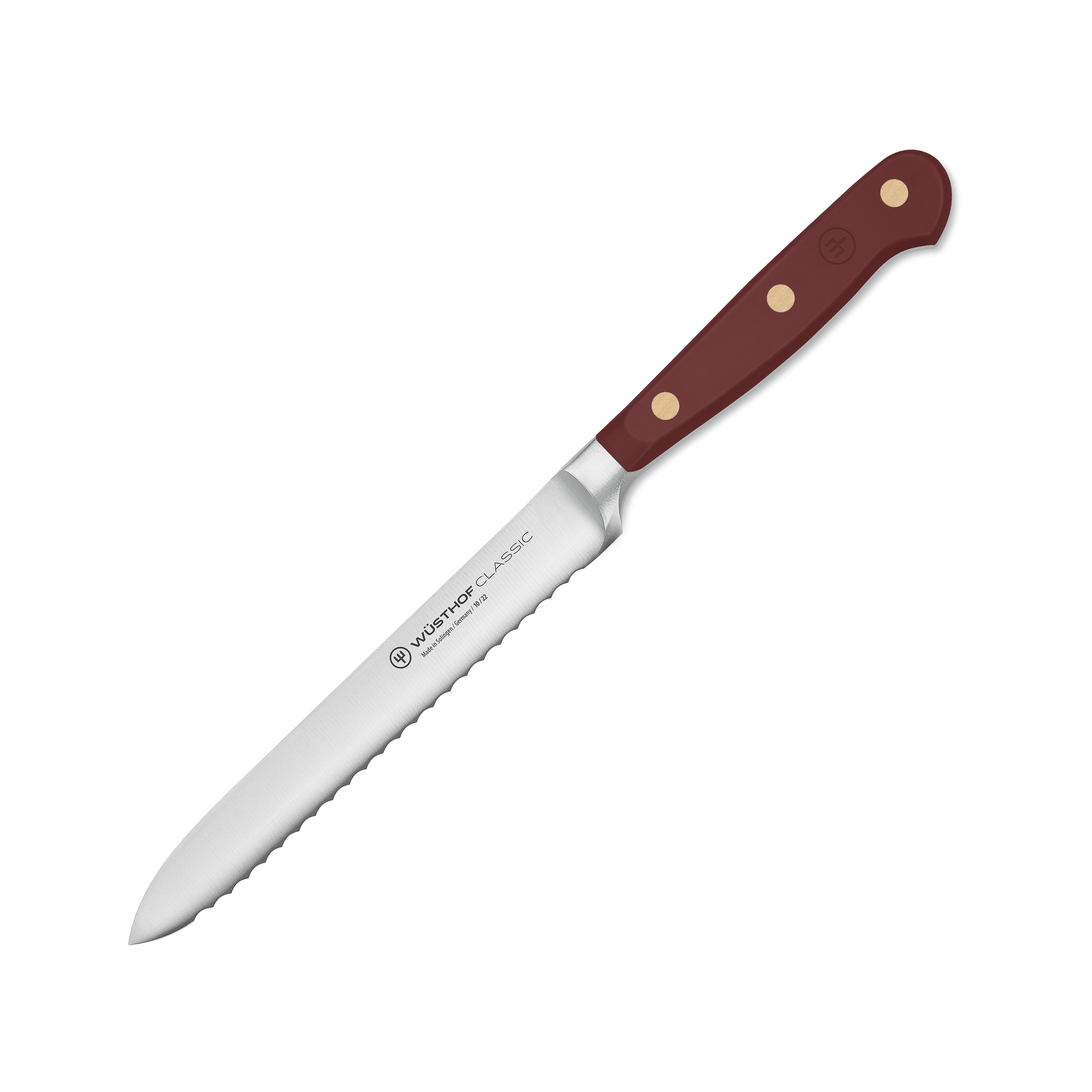 Close-up of the Wusthof Classic serrated utility knife highlighting its precision edge.