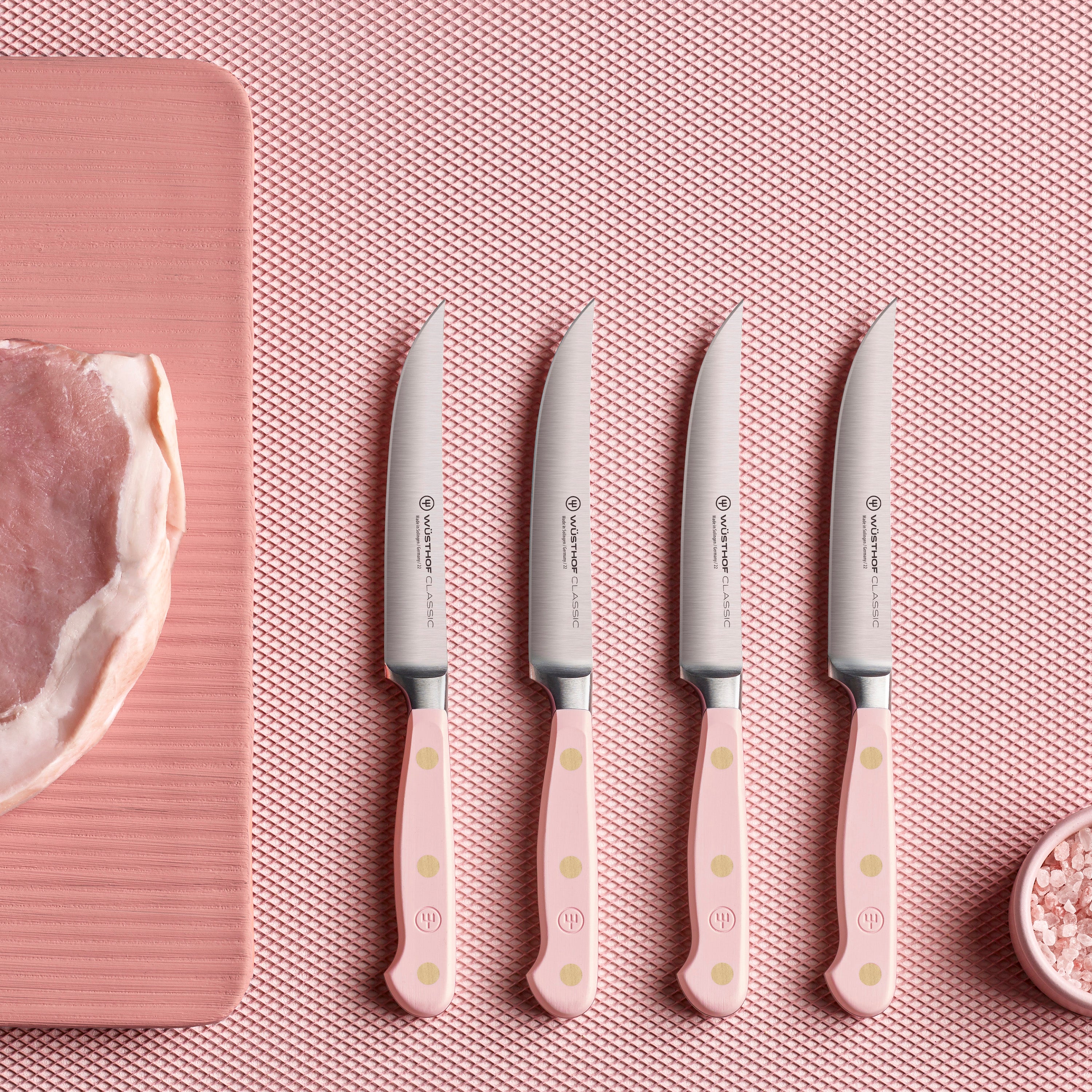 Detailed view of high-carbon stainless steel steak knives for grilling